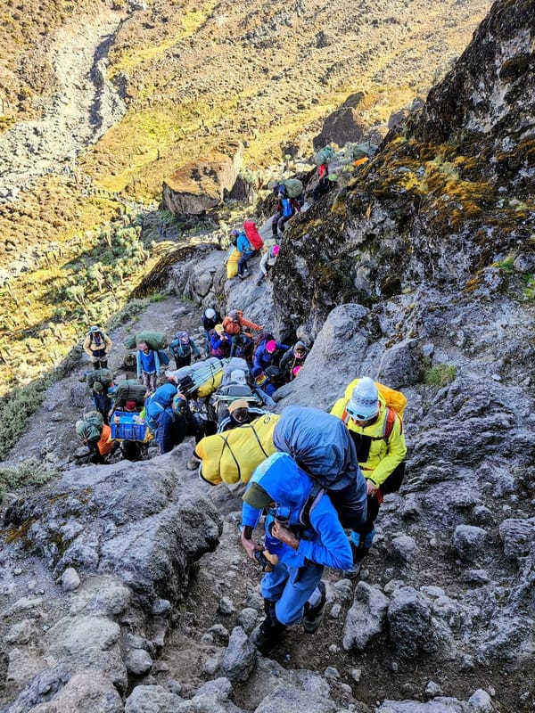Climbers on the Barranco Wall scramble, Southern Circuit.